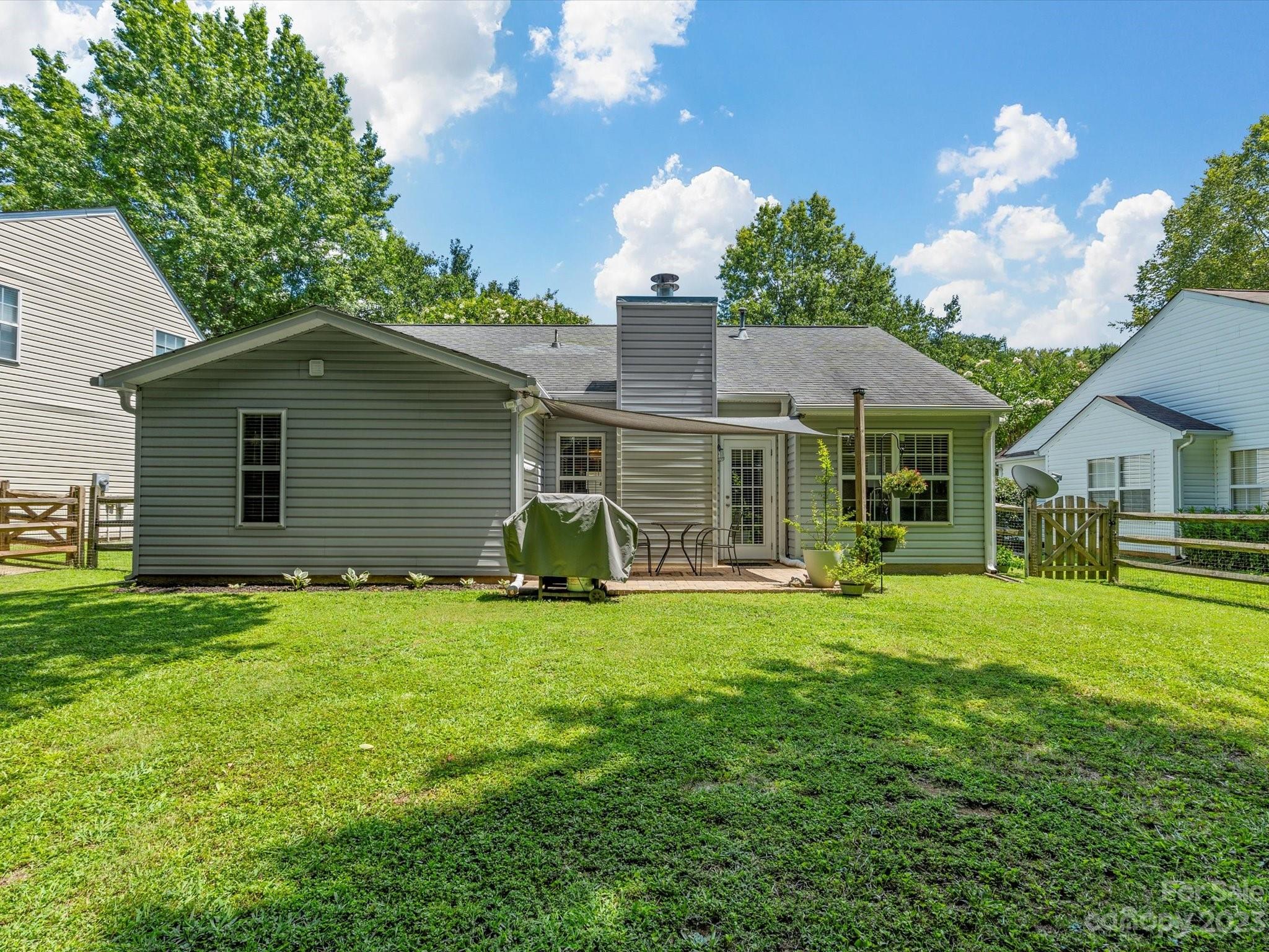 14510 Arbor Ridge Drive Charlotte, NC 28273 - Photo 31 of 34 a front view of a house with garden