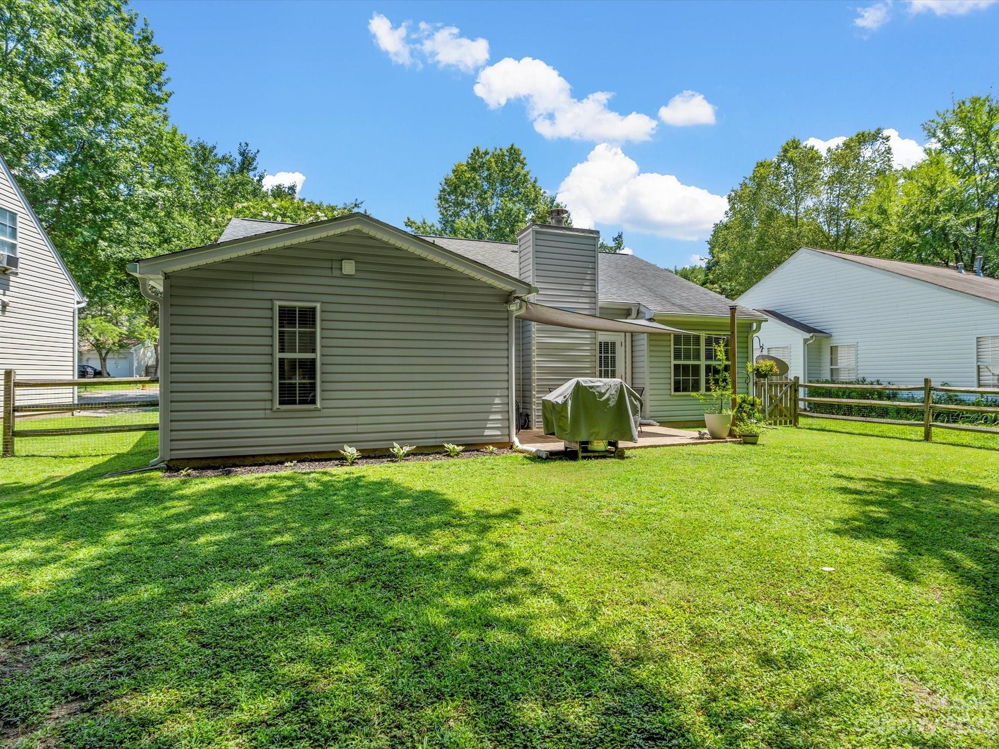 14510 Arbor Ridge Drive Charlotte, NC 28273 - Photo 32 of 34 a view of a house with a backyard