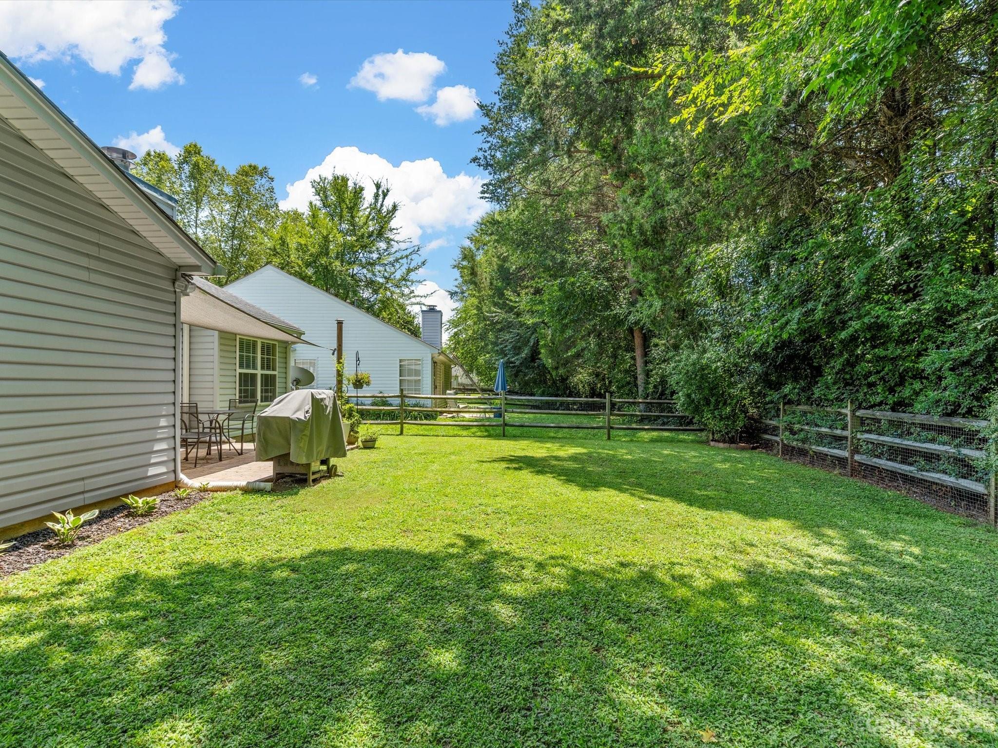 14510 Arbor Ridge Drive Charlotte, NC 28273 - Photo 33 of 34 a view of a house with a yard porch and sitting area