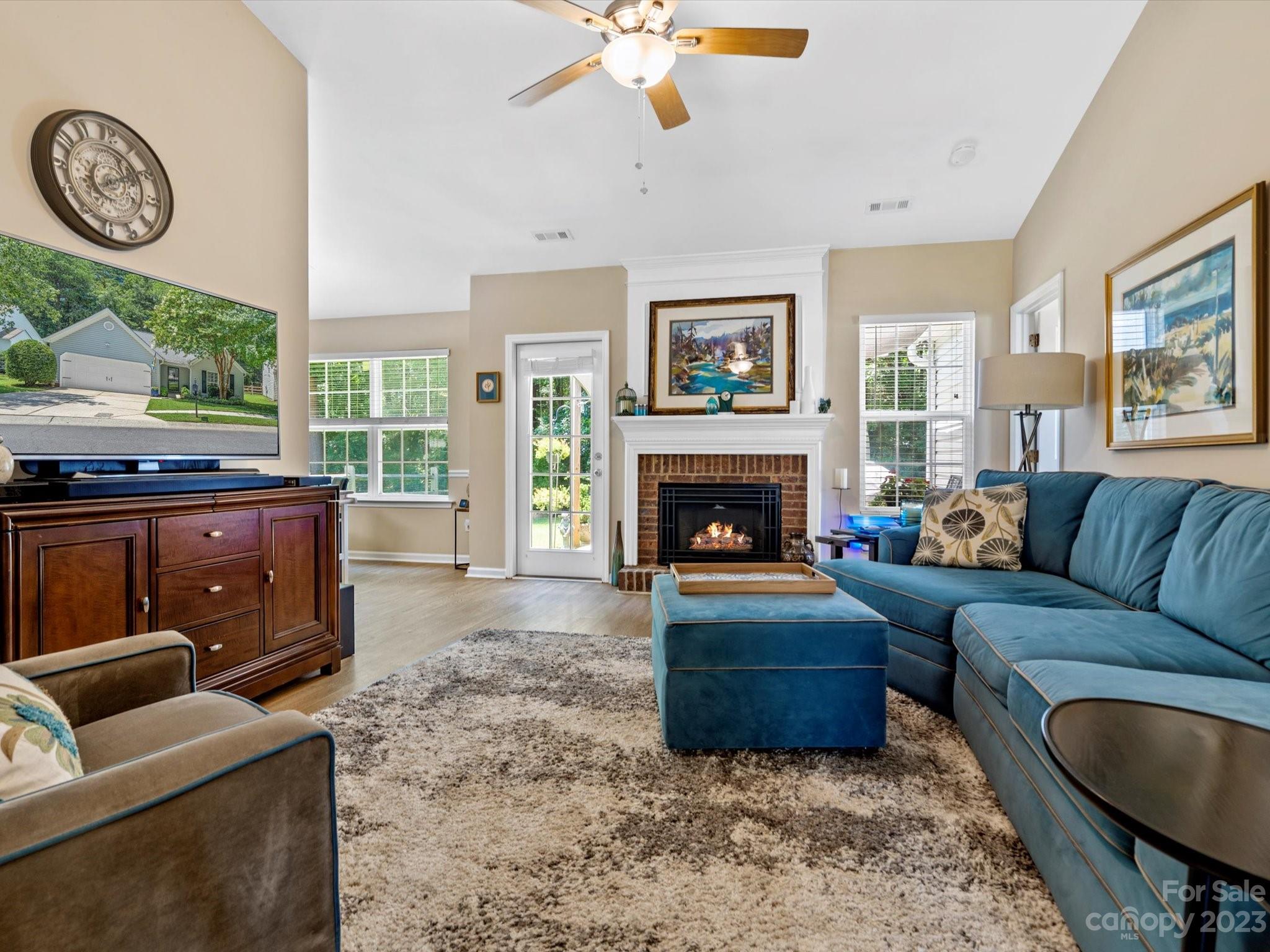 14510 Arbor Ridge Drive Charlotte, NC 28273 - Photo 7 of 34 a living room with furniture and a fireplace