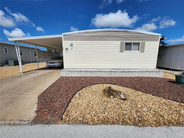 a view of a house with a roof deck