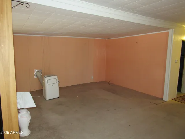 a view of a backyard house and swimming pool