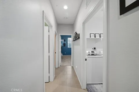 a view of a hallway with closet