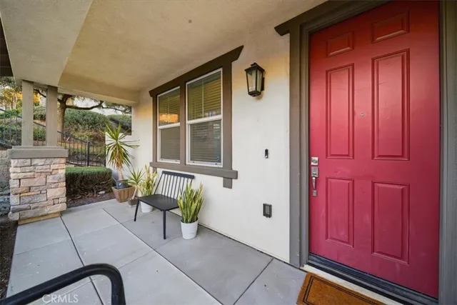 a view of a entryway door front of a house