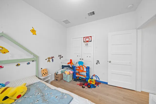 a kitchen with stainless steel appliances granite countertop a sink refrigerator and cabinets