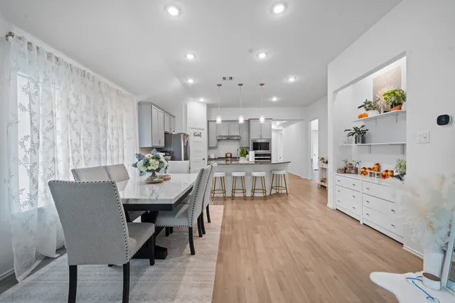 a view of a dining room with furniture