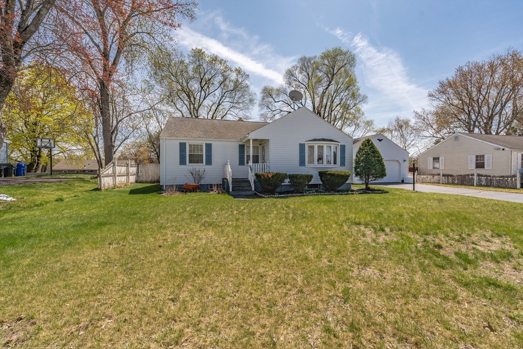 127 Cheyenne Road Springfield, MA 01109 - Photo 2 of 42 a front view of house with yard and green space