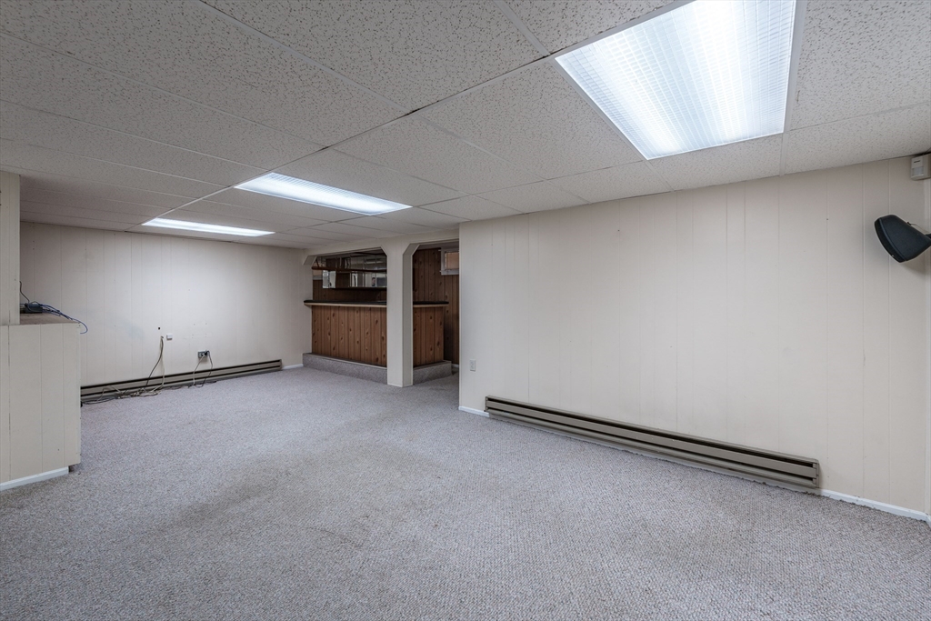 127 Cheyenne Road Springfield, MA 01109 - Photo 29 of 42 an empty room with a empty space and windows