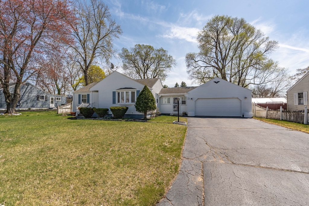 127 Cheyenne Road Springfield, MA 01109 - Photo 3 of 42 a front view of house with yard and trees
