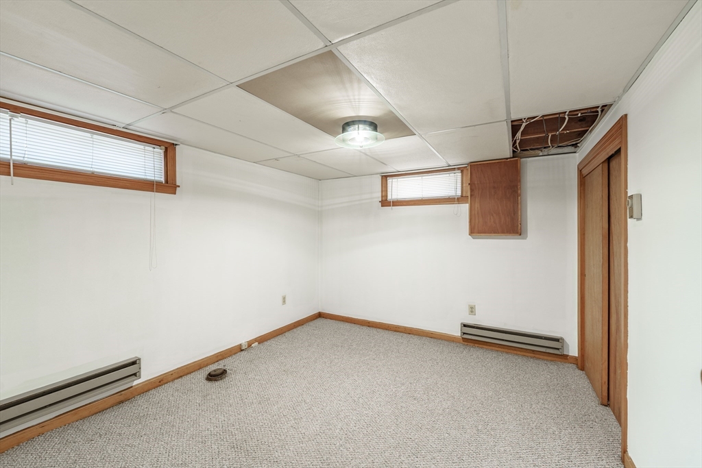 127 Cheyenne Road Springfield, MA 01109 - Photo 34 of 42 a view of a room with racks on the wall