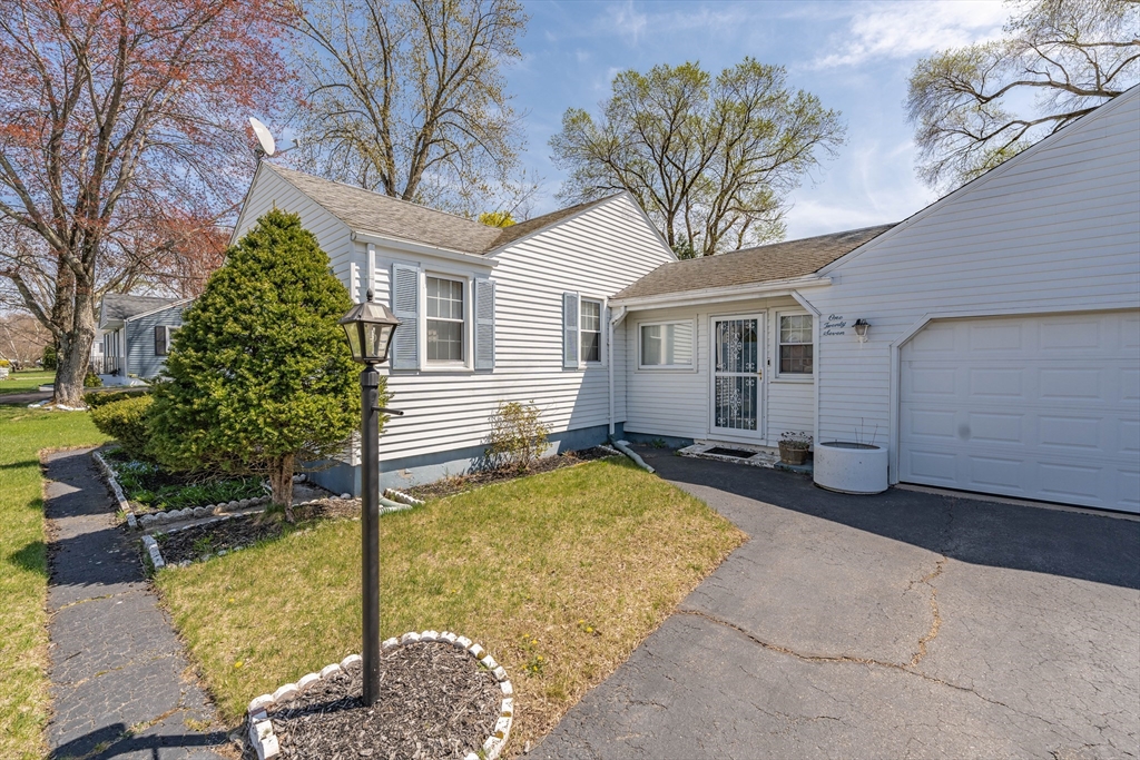 127 Cheyenne Road Springfield, MA 01109 - Photo 4 of 42 a view of a house with backyard and sitting area