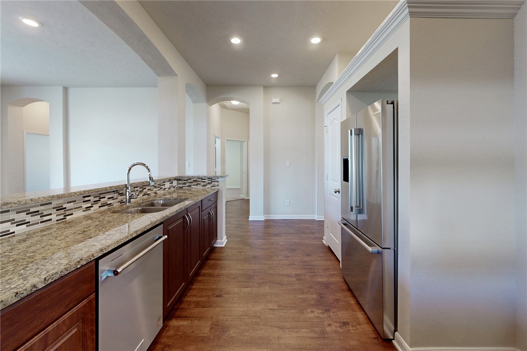 2101 Polmont Drive Bryan, TX 77807 - Photo 11 of 44 a large kitchen with granite countertop a lot of counter space