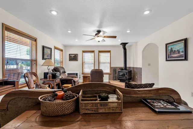 a kitchen that has a sink and a stove in it