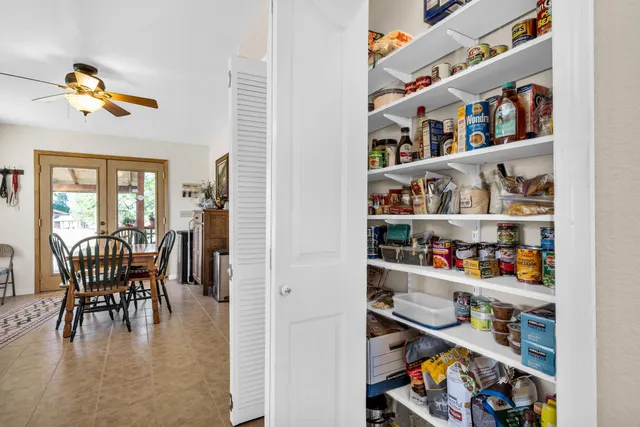 a view of a hallway view with staircase