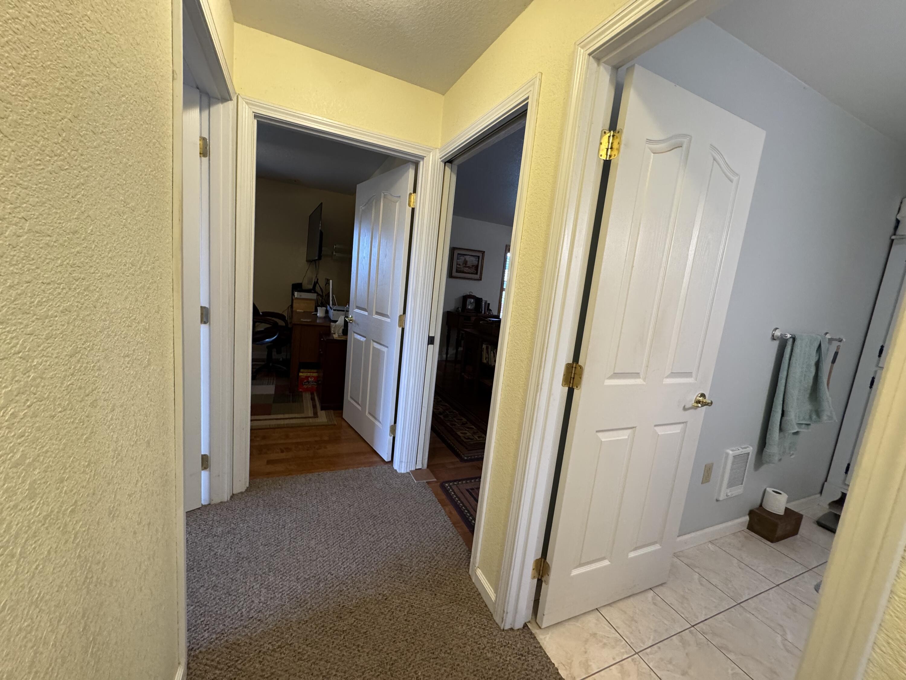 26929 Linfield Street Fall River Mills, CA 96028 - Photo 30 of 66 a view of a hallway view with staircase
