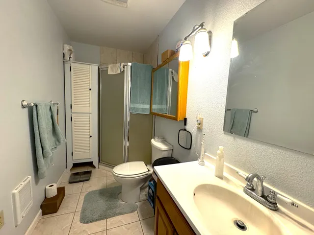 a view of a house with a outdoor space and porch