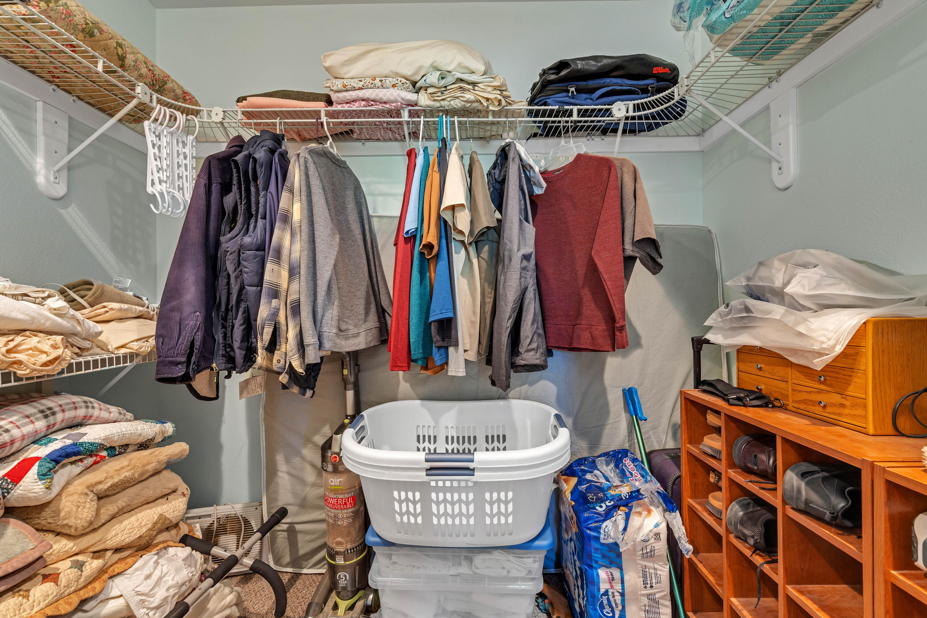 26929 Linfield Street Fall River Mills, CA 96028 - Photo 36 of 66 a view of walk in closet with clothes and shoes