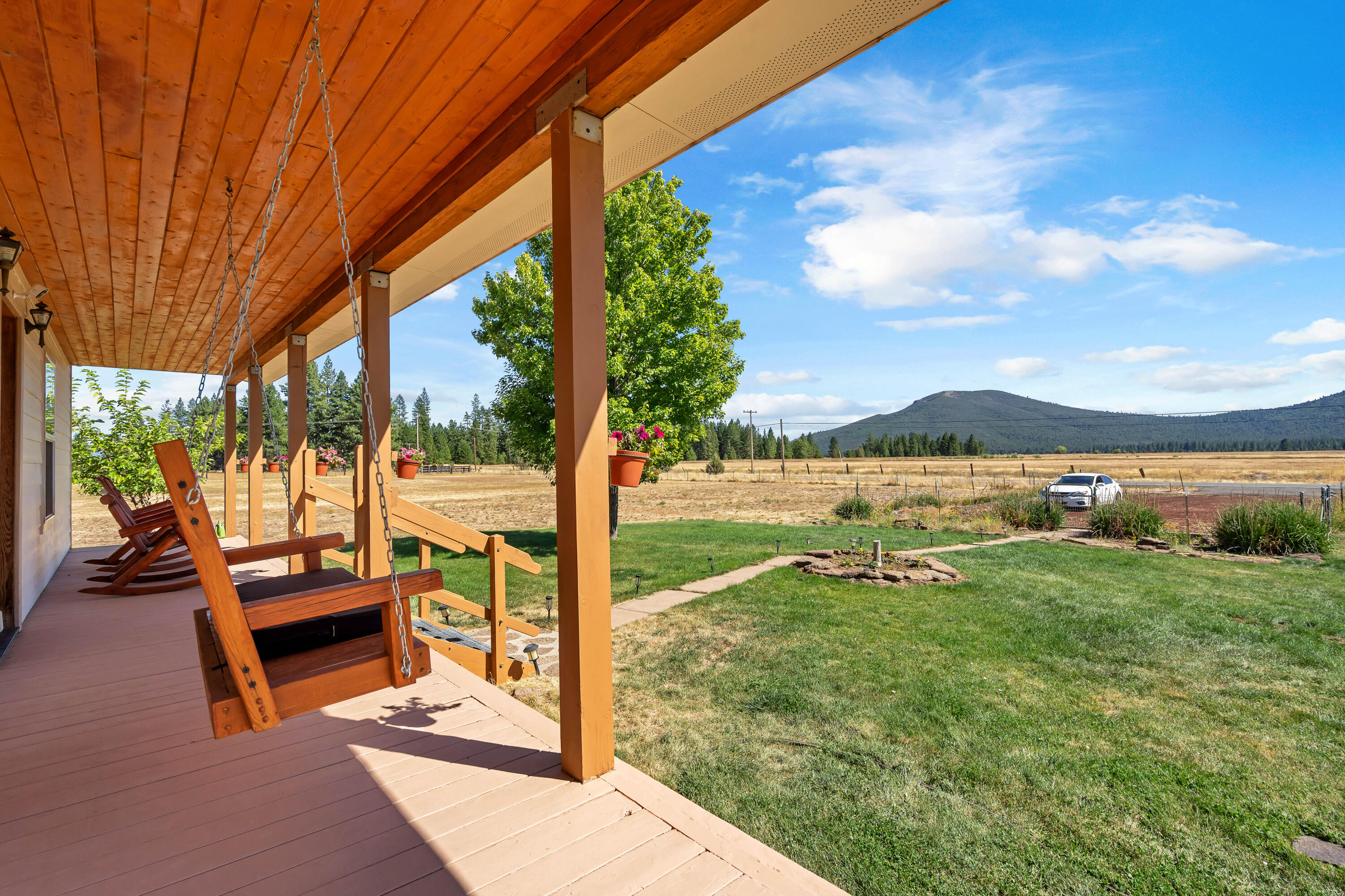 26929 Linfield Street Fall River Mills, CA 96028 - Photo 8 of 66 a view of a swimming pool with a patio