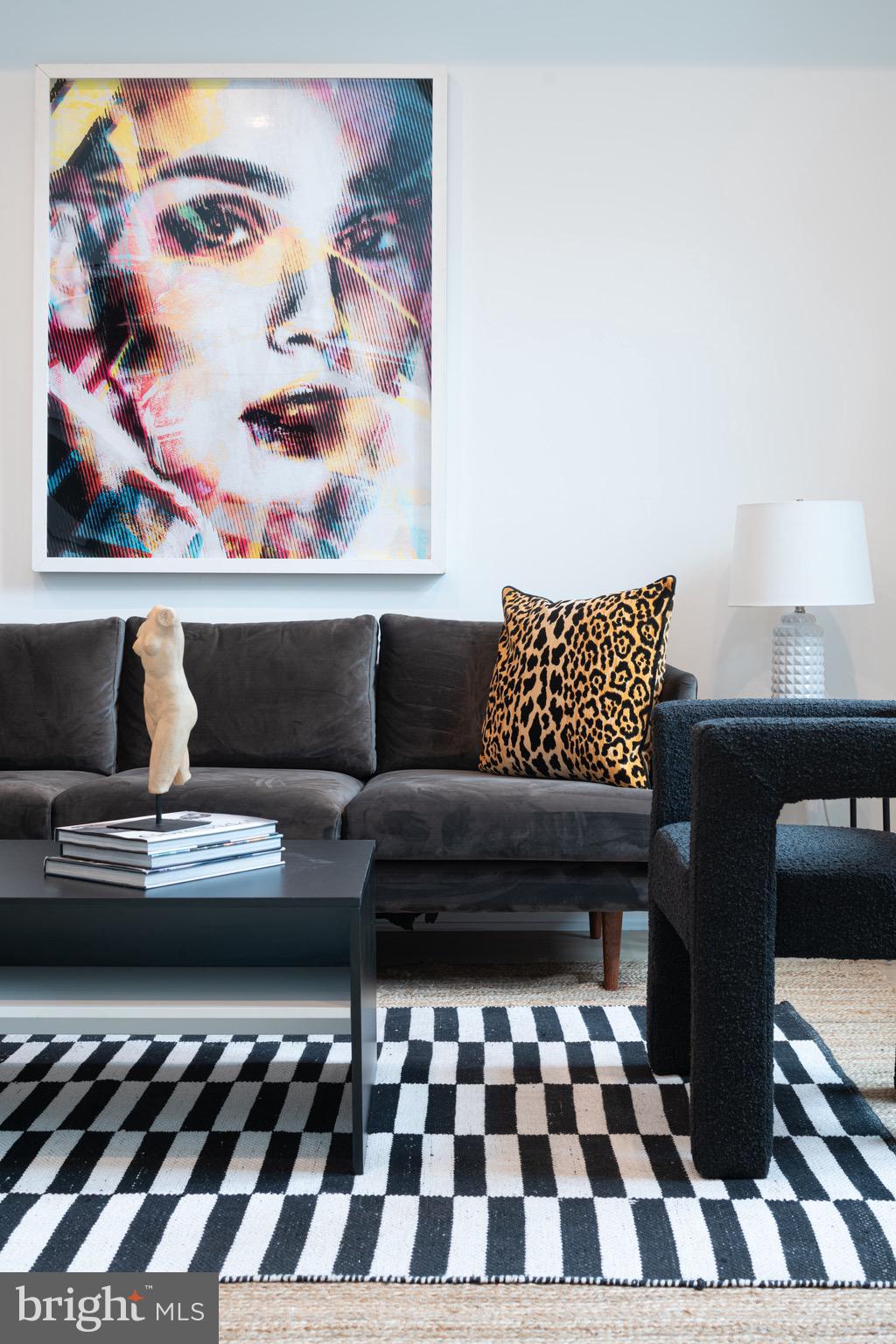 2324 Sansom Street Philadelphia, PA 19103 - Photo 22 of 82 a living room with a black white checkered floor with a black white checkered floor