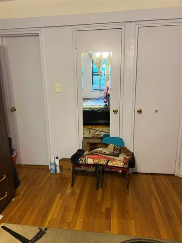 a bedroom with a bed and a table