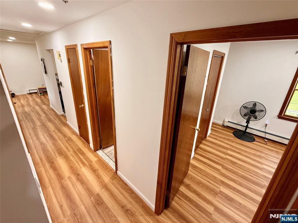 154 Cork Hill Road Franklin, NJ 07416 - Photo 18 of 35 a view of a closet with wooden floor