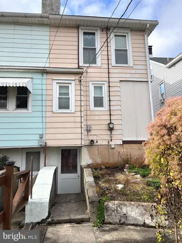 a front view of a house with garage