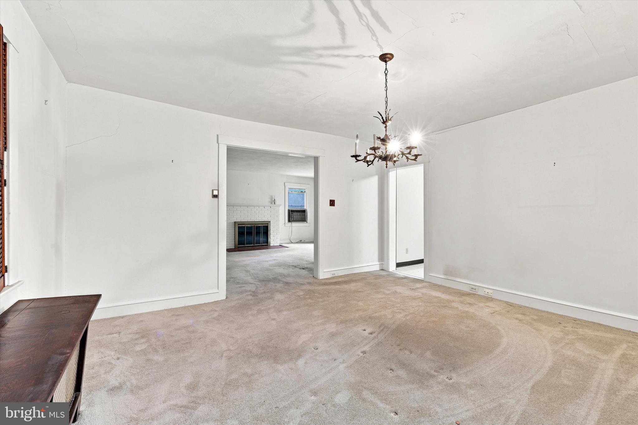 341 North Rolling Road Springfield, PA 19064 - Photo 7 of 15 a view of a chandelier in an empty room