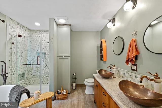 a view of a dining room with furniture and a window