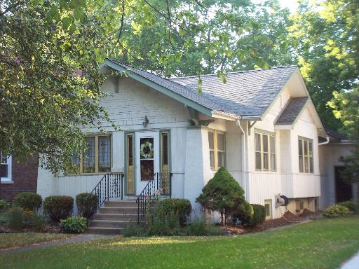 336 Olmsted Road Riverside, IL 60546 - Photo 1 of 12 a front view of a house with a yard