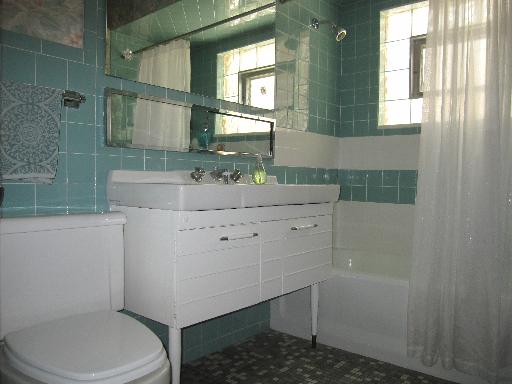 336 Olmsted Road Riverside, IL 60546 - Photo 12 of 12 a bathroom with a sink toilet vanity and shower