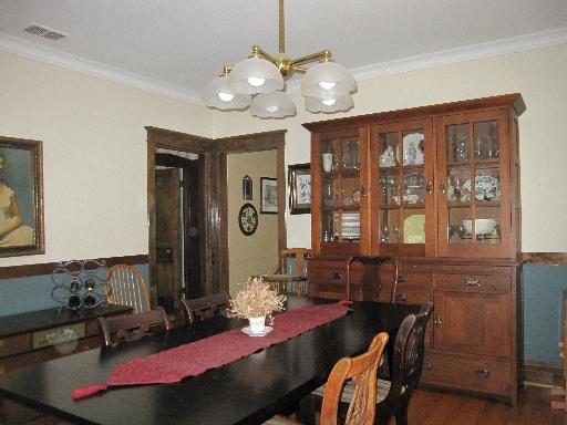 336 Olmsted Road Riverside, IL 60546 - Photo 4 of 12 a dining room with furniture and window