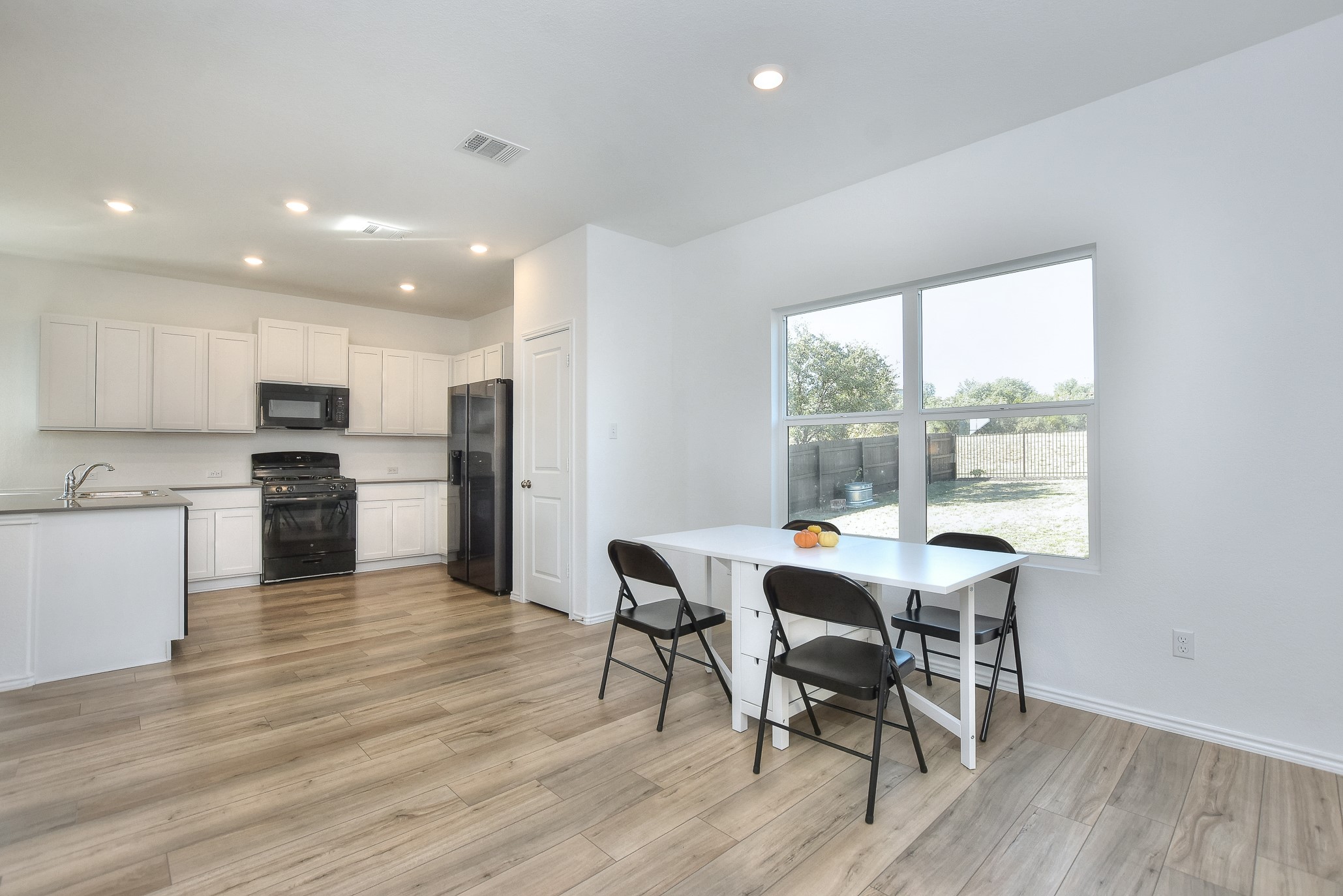 2221 Four Waters Loop Georgetown, TX 78628 - Photo 16 of 40 Kitchen/Dining Area