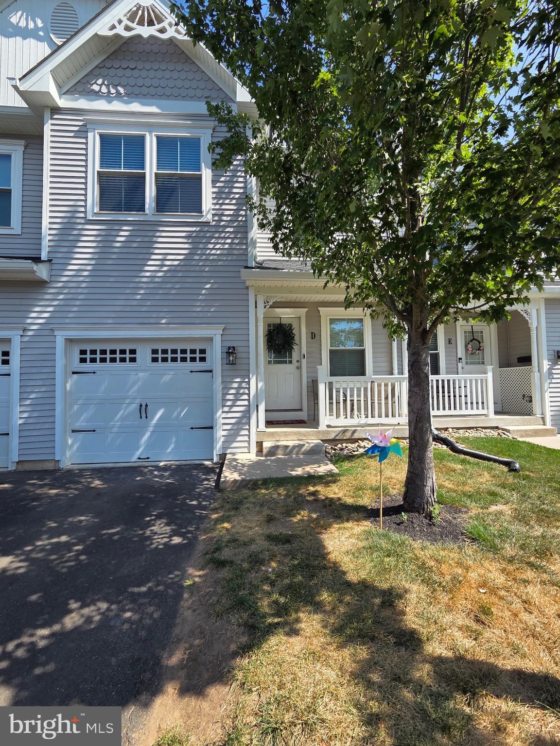 400 North York Road, Unit D Hatboro, PA 19040 - Photo 1 of 48 a front view of a house with a yard
