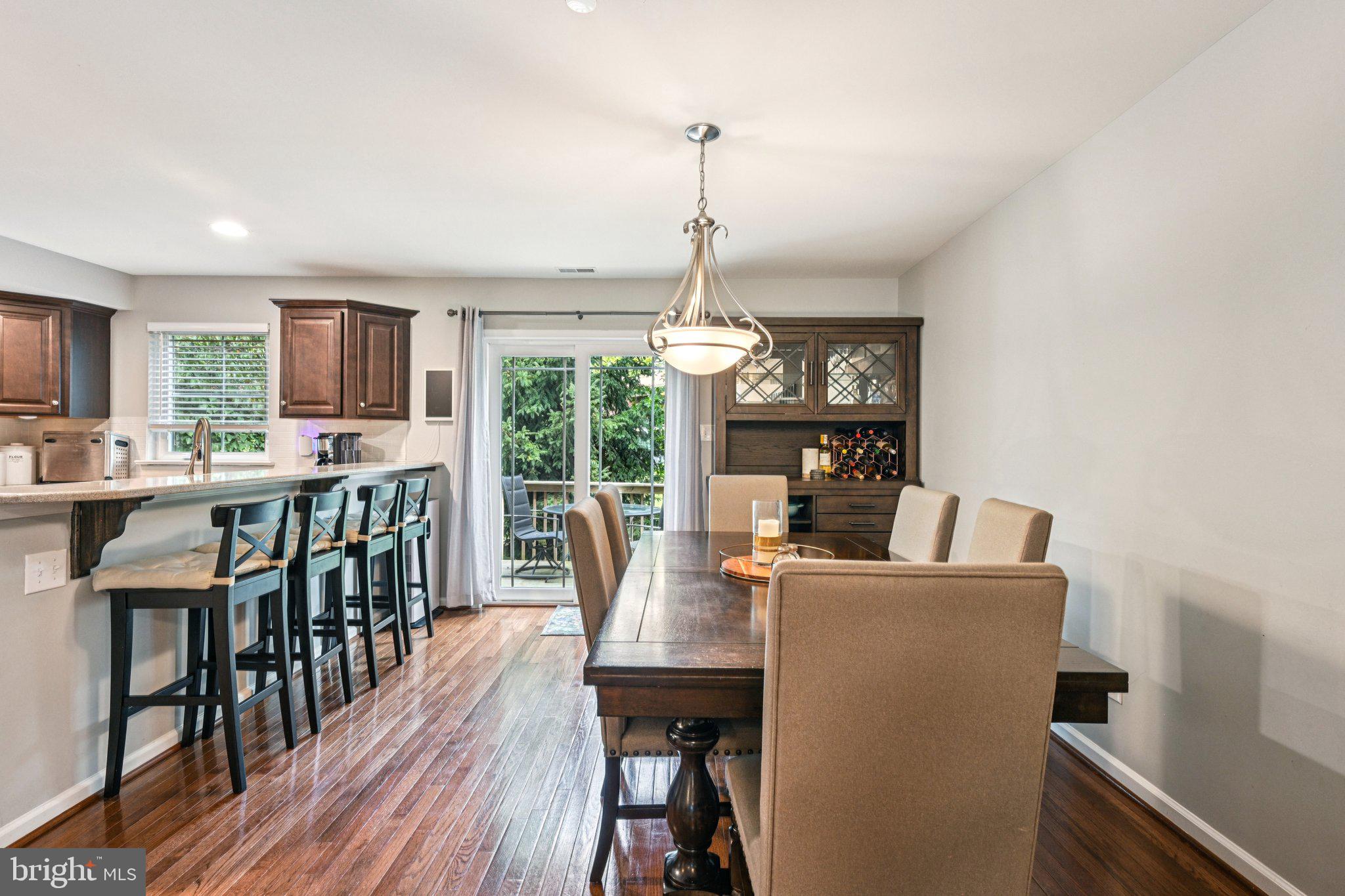 400 North York Road, Unit D Hatboro, PA 19040 - Photo 14 of 48 a dining room with furniture a chandelier and wooden floor