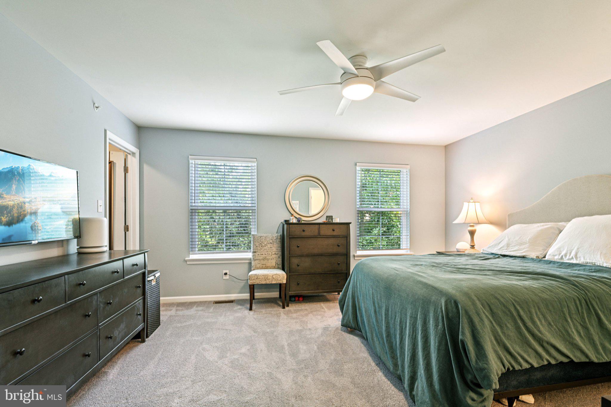 400 North York Road, Unit D Hatboro, PA 19040 - Photo 24 of 48 a bedroom with a bed and a large window