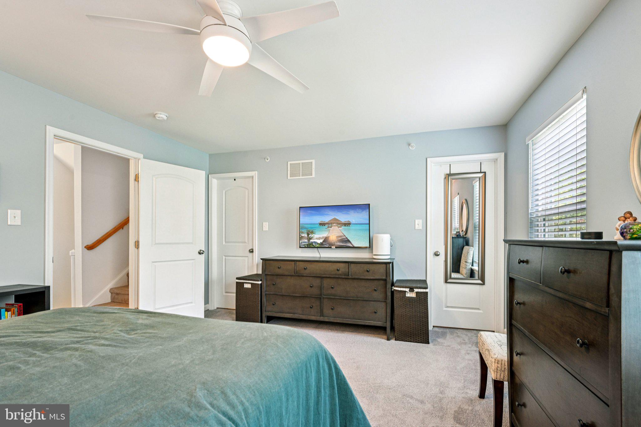 400 North York Road, Unit D Hatboro, PA 19040 - Photo 25 of 48 a bedroom with a bed and a chandelier