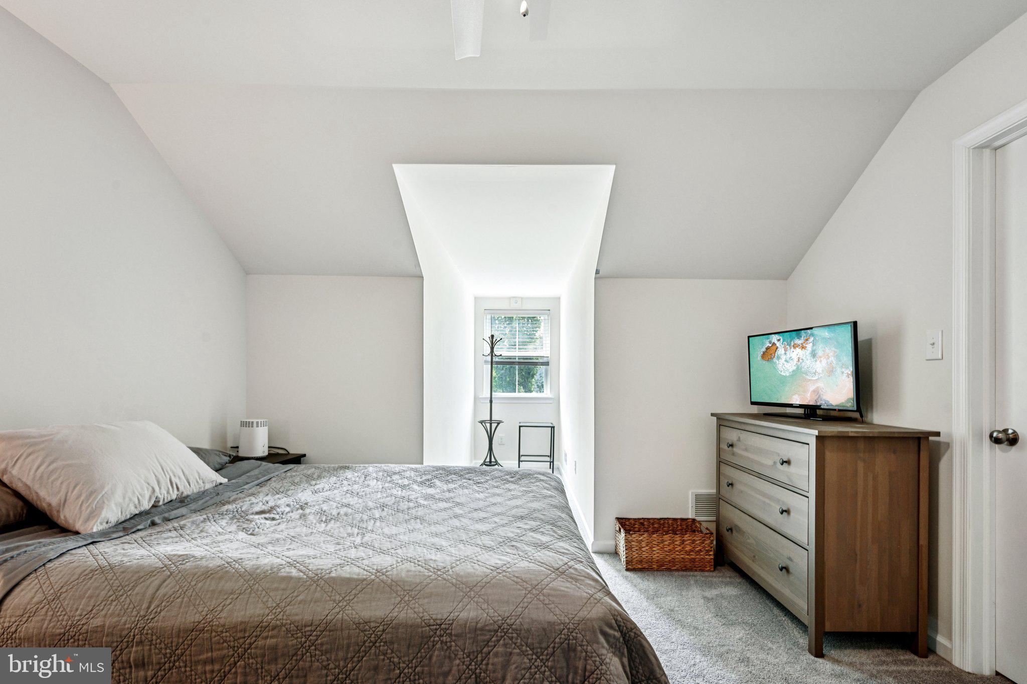 400 North York Road, Unit D Hatboro, PA 19040 - Photo 40 of 48 a bedroom with a bed and a flat screen tv