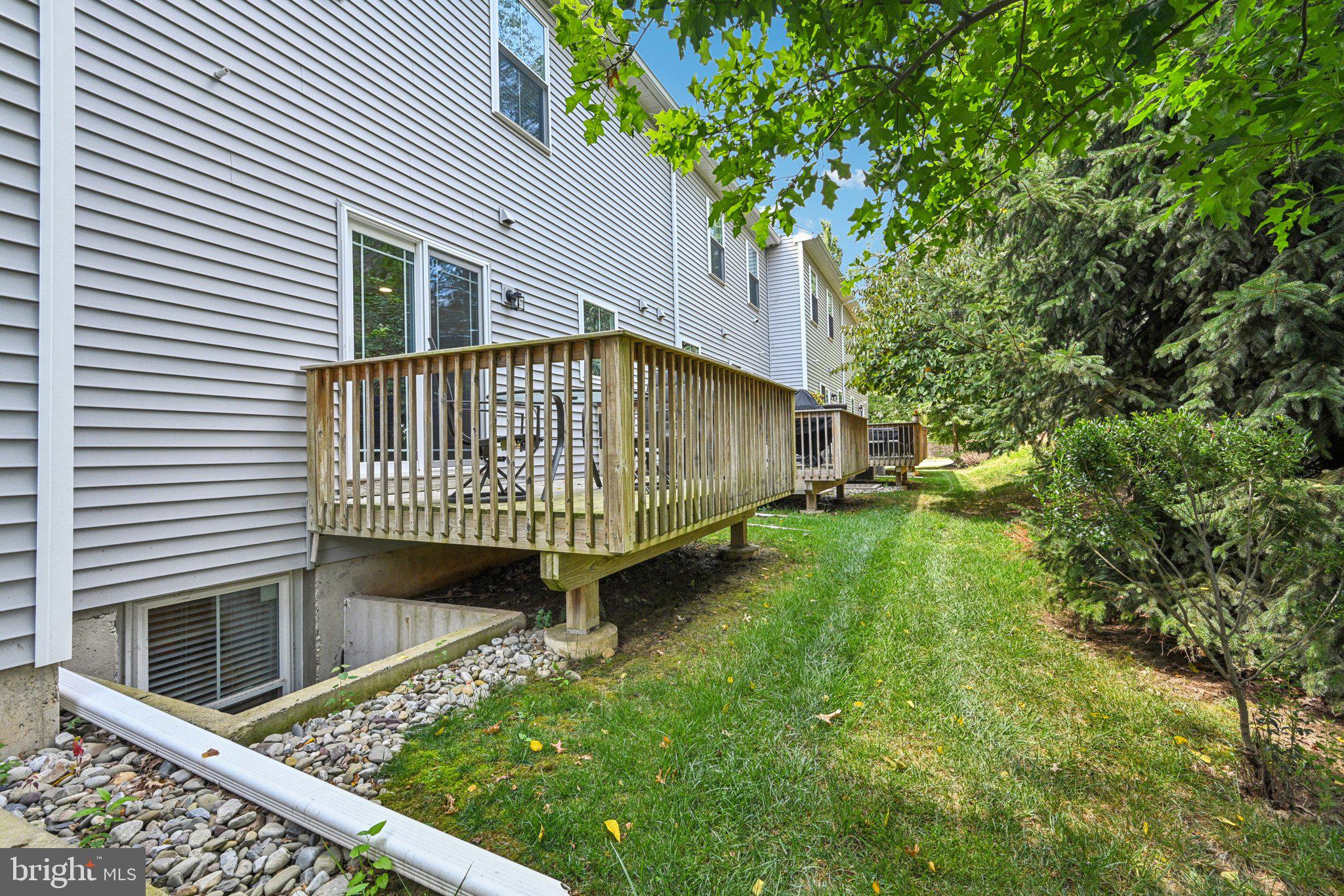 400 North York Road, Unit D Hatboro, PA 19040 - Photo 44 of 48 a view of a house with a yard and deck