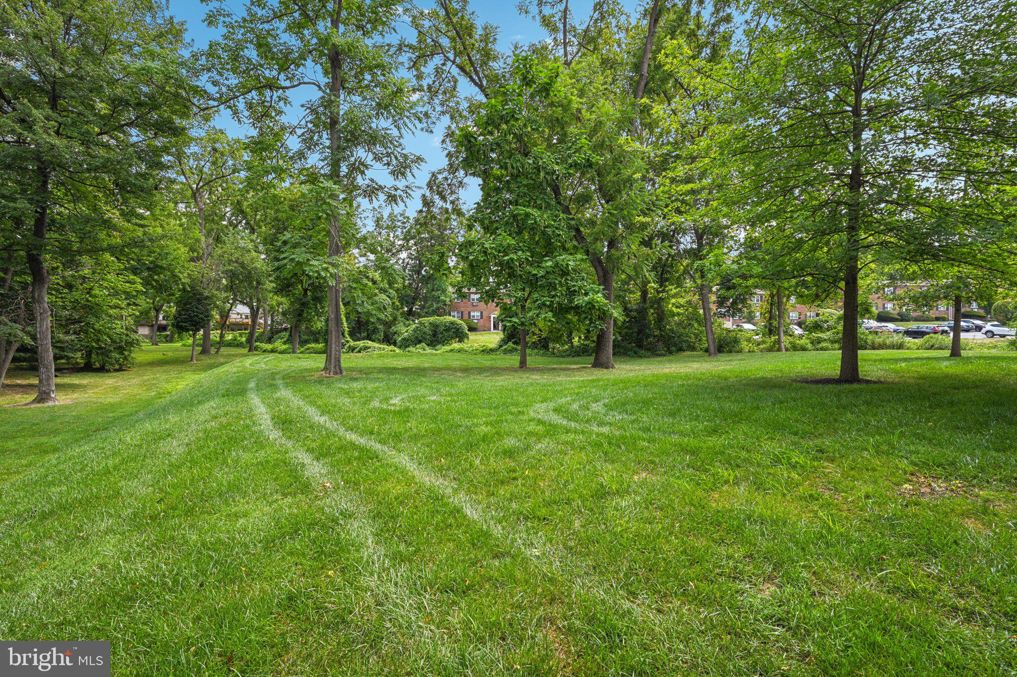 400 North York Road, Unit D Hatboro, PA 19040 - Photo 46 of 48 a view of grassy field with benches and trees all around