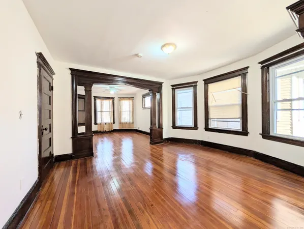 a view of livingroom with hardwood floor and window