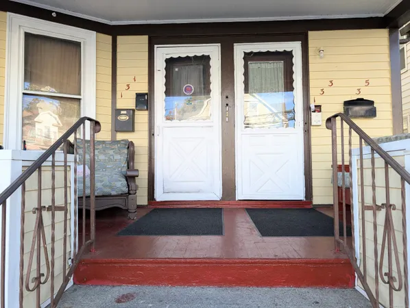 a view of an entryway with staircase