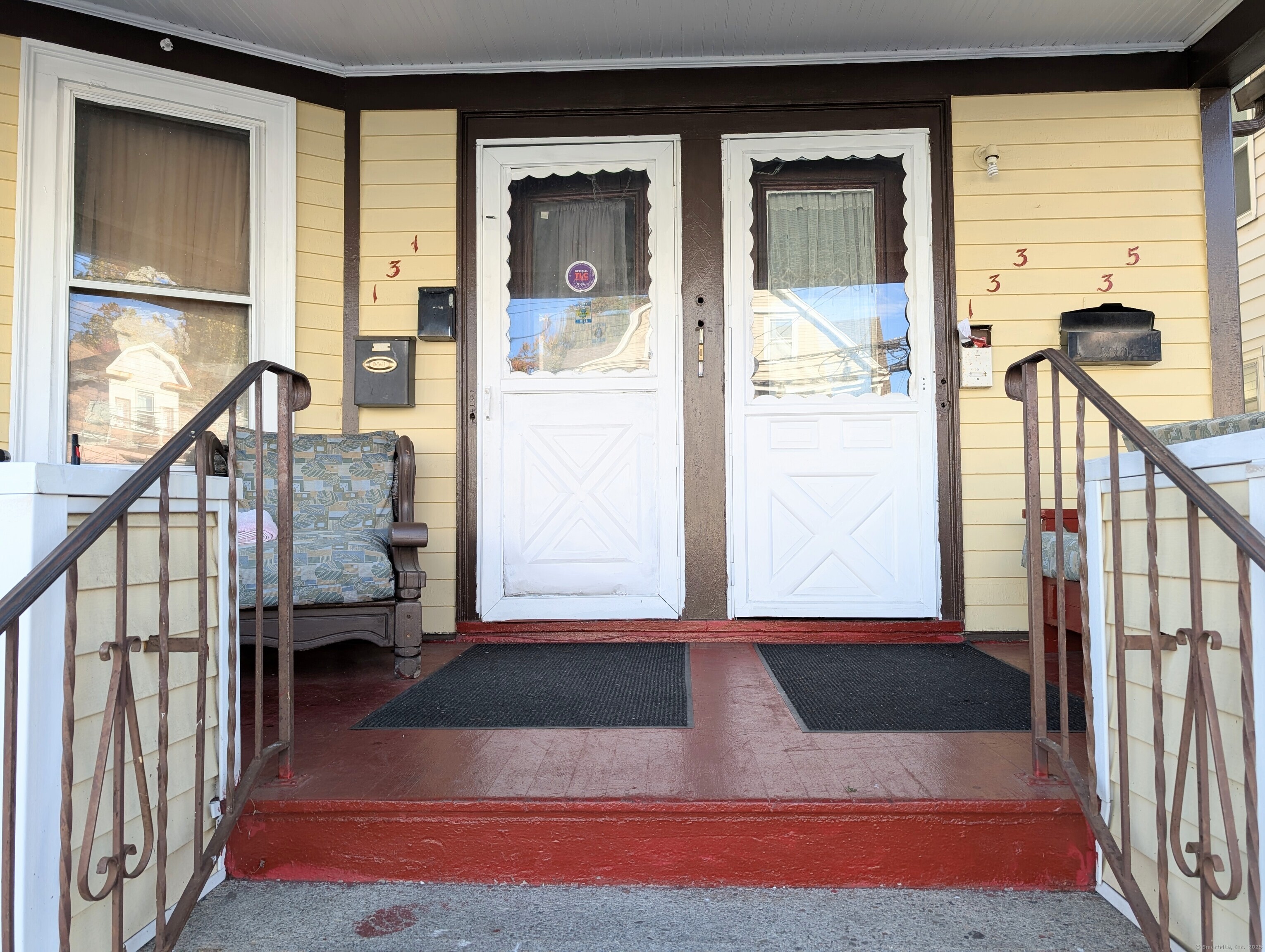 133 Poplar Street Bridgeport, CT 06605 - Photo 3 of 36 a view of an entryway with staircase