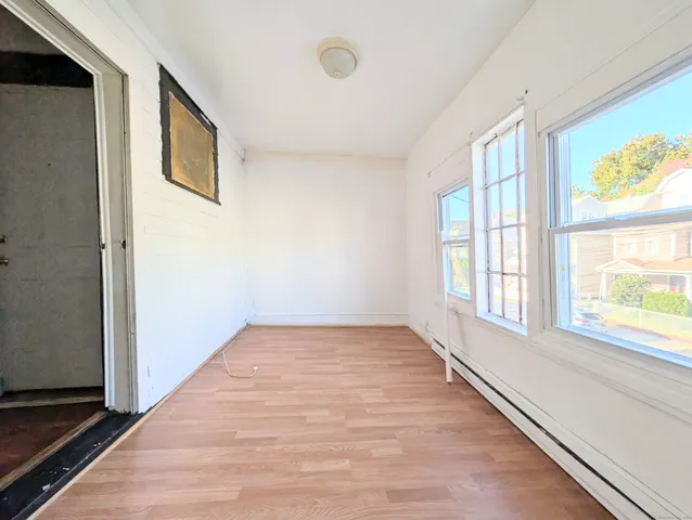 a view of an empty room and window