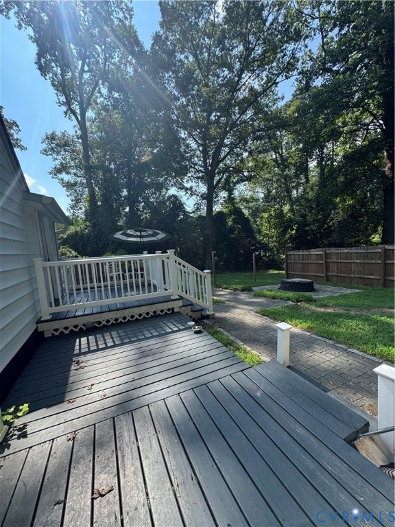 2720 Osborne Road Chester, VA 23831 - Photo 3 of 3 Expansive outdoor deck with dark wood-finish plank