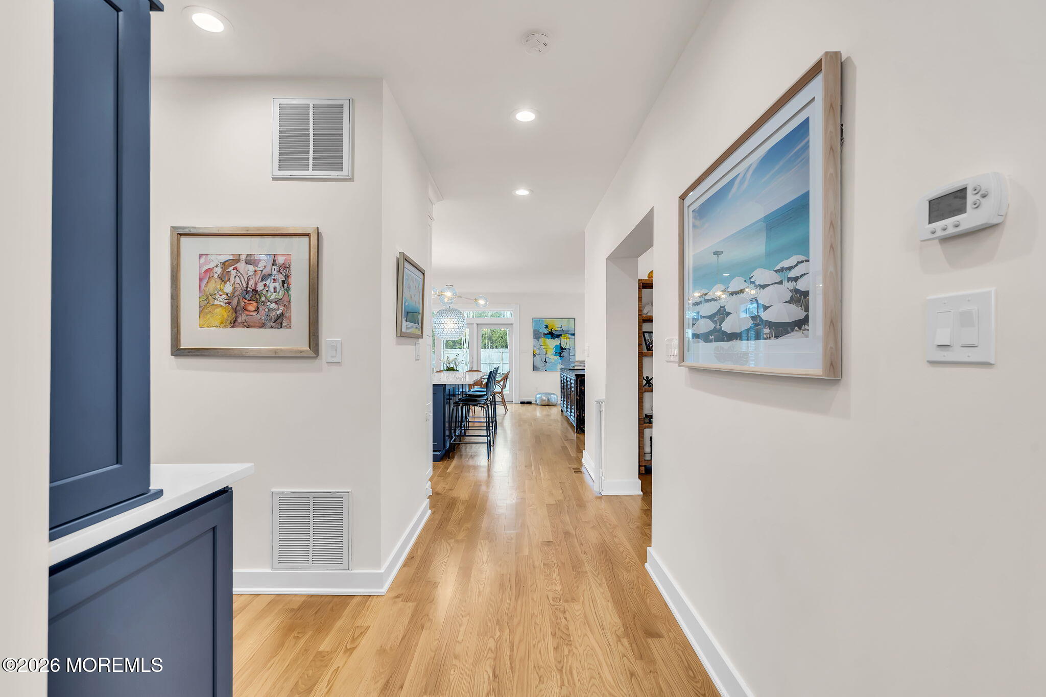 208 Salem Avenue Spring Lake, NJ 07762 - Photo 22 of 102 a view of a hallway with wooden floor and furniture