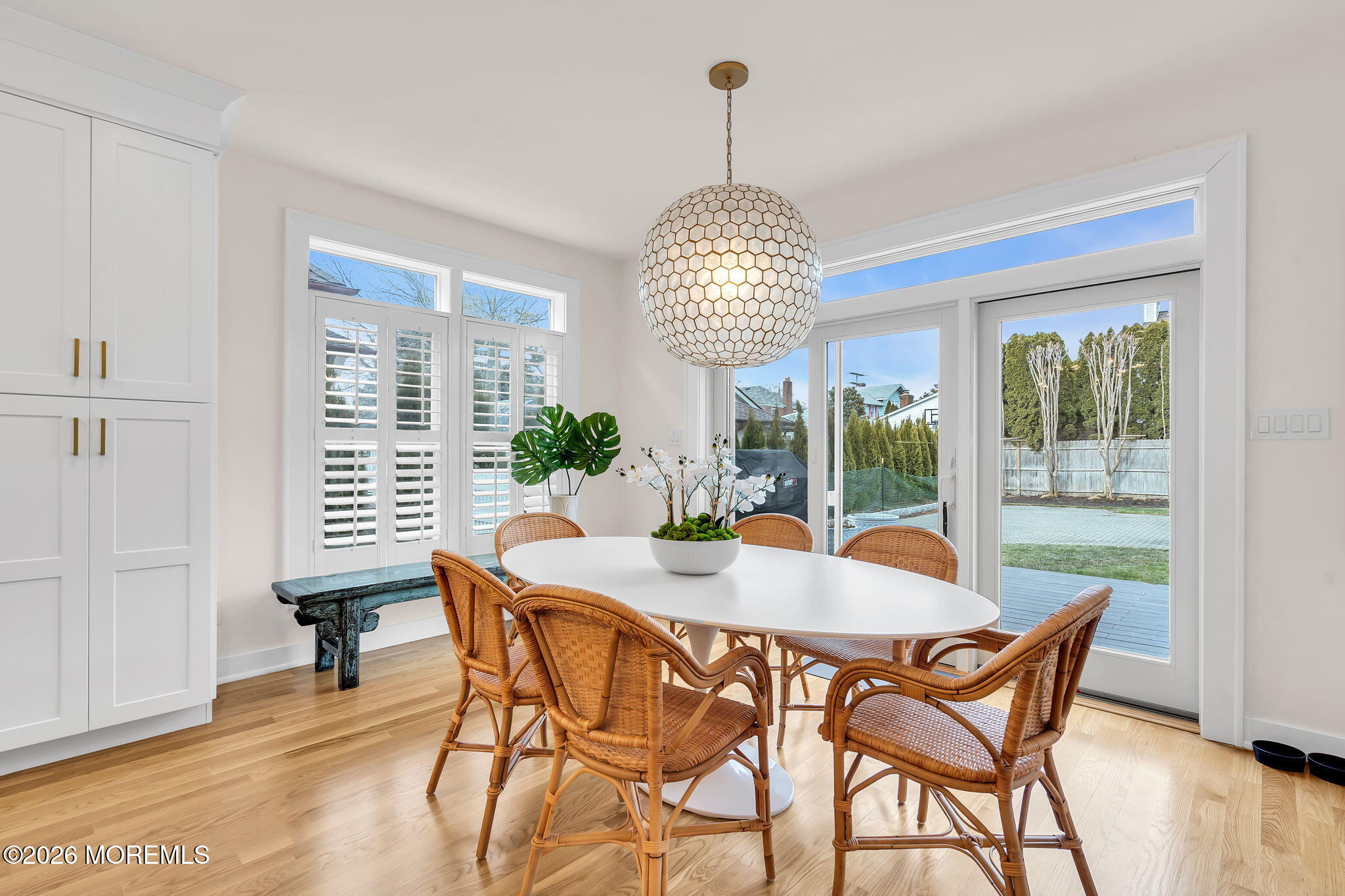 208 Salem Avenue Spring Lake, NJ 07762 - Photo 34 of 102 a view of a dining room with furniture wooden floor and chandelier