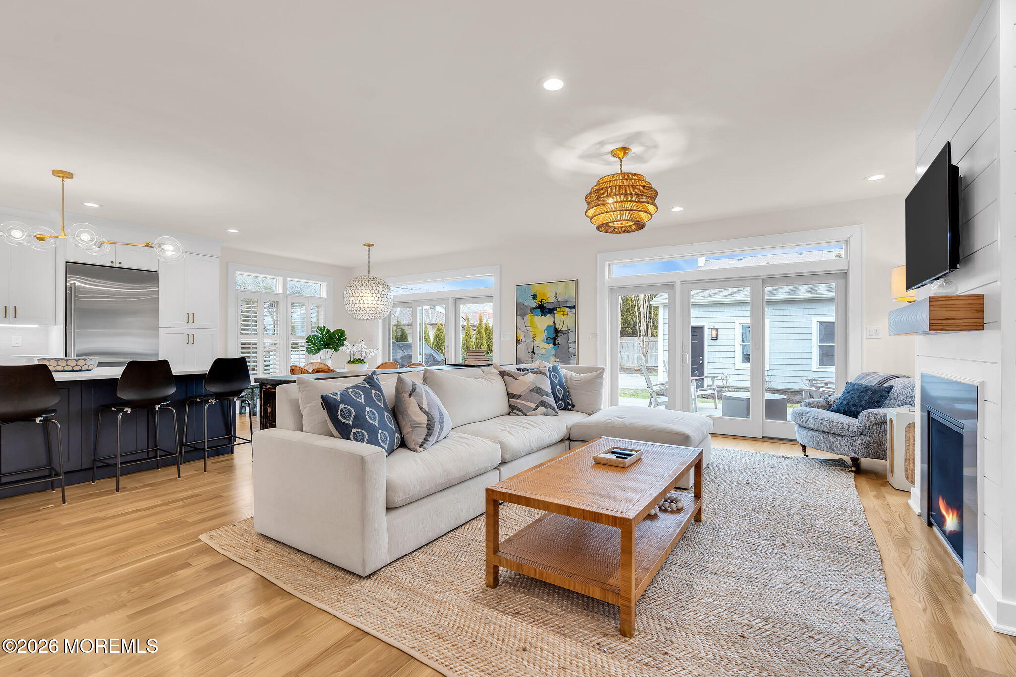 208 Salem Avenue Spring Lake, NJ 07762 - Photo 40 of 102 a living room with furniture and a chandelier
