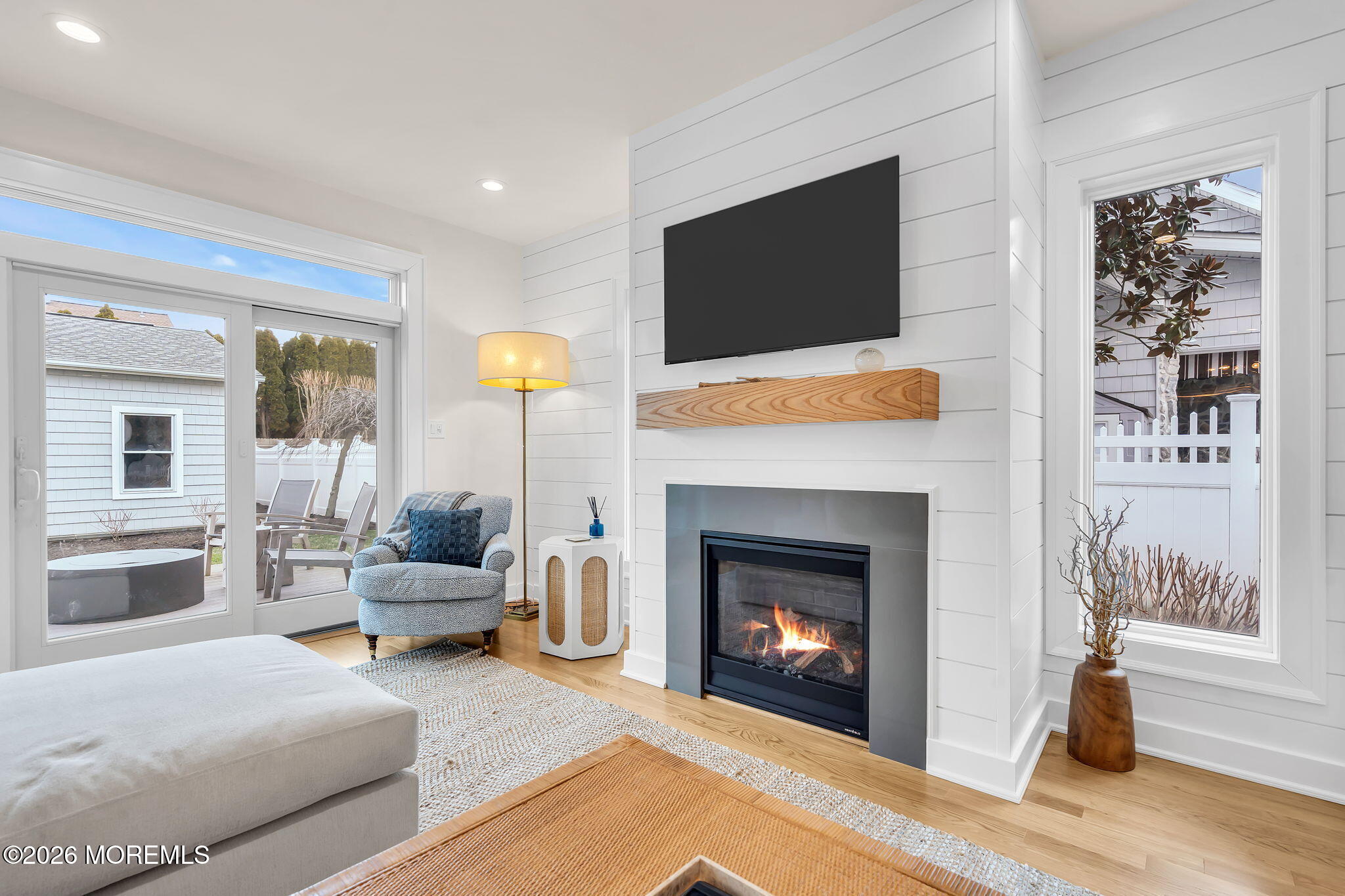 208 Salem Avenue Spring Lake, NJ 07762 - Photo 42 of 102 a living room with furniture and a fireplace