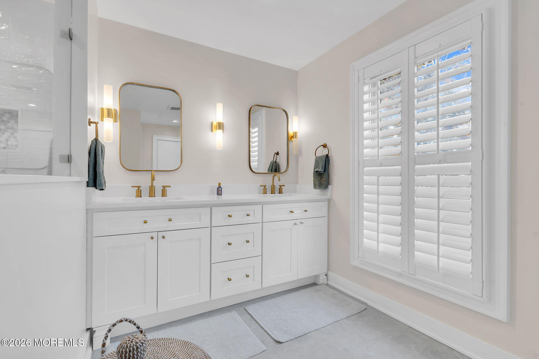 208 Salem Avenue Spring Lake, NJ 07762 - Photo 55 of 102 a bathroom with a double vanity sink and a mirror