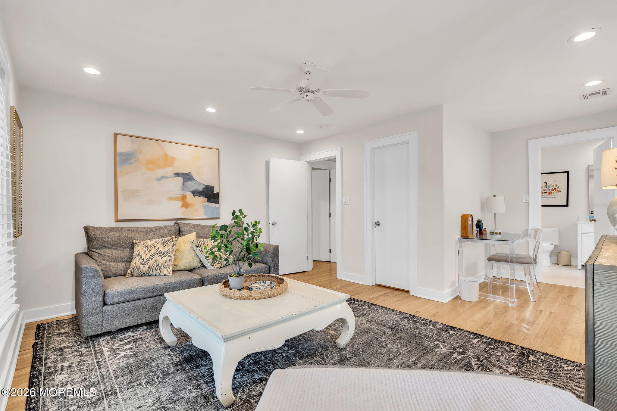 208 Salem Avenue Spring Lake, NJ 07762 - Photo 58 of 102 a living room with furniture and a table